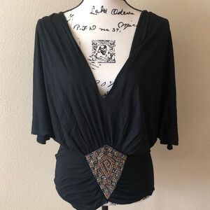 Beautiful black top with deep v neck